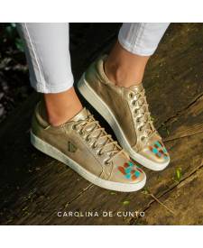 Sneakers Dasha gold con arte turquesa